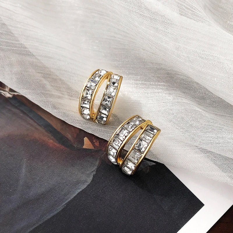 Simple C-shaped Diamond Earrings - Image 3